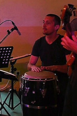 Julien playing Congas